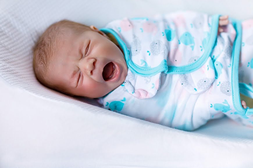 Owiń swoje dziecko kiedy ni eprzestaje płakać